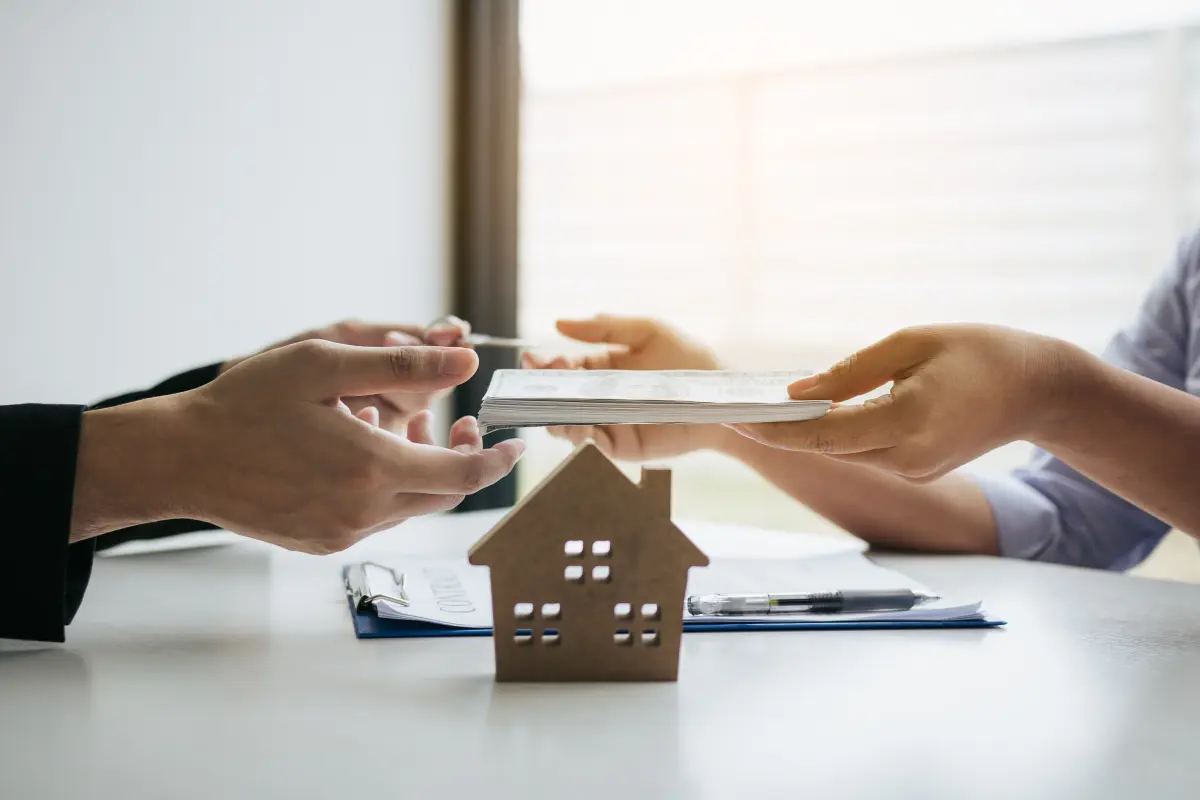 real estate investors hand shaking